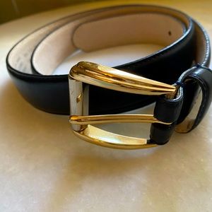 Navy belt with gold buckle